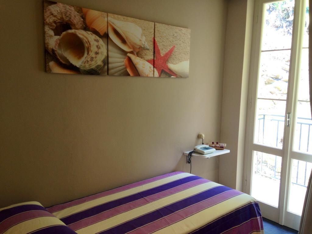 Hotel L'Approdo ปอร์โตอัซซูร์โร ภายนอก รูปภาพ